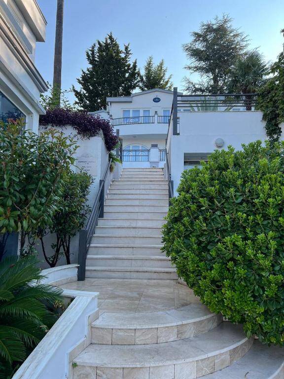 Stairway through the garden leading up to Hotel Xanadu